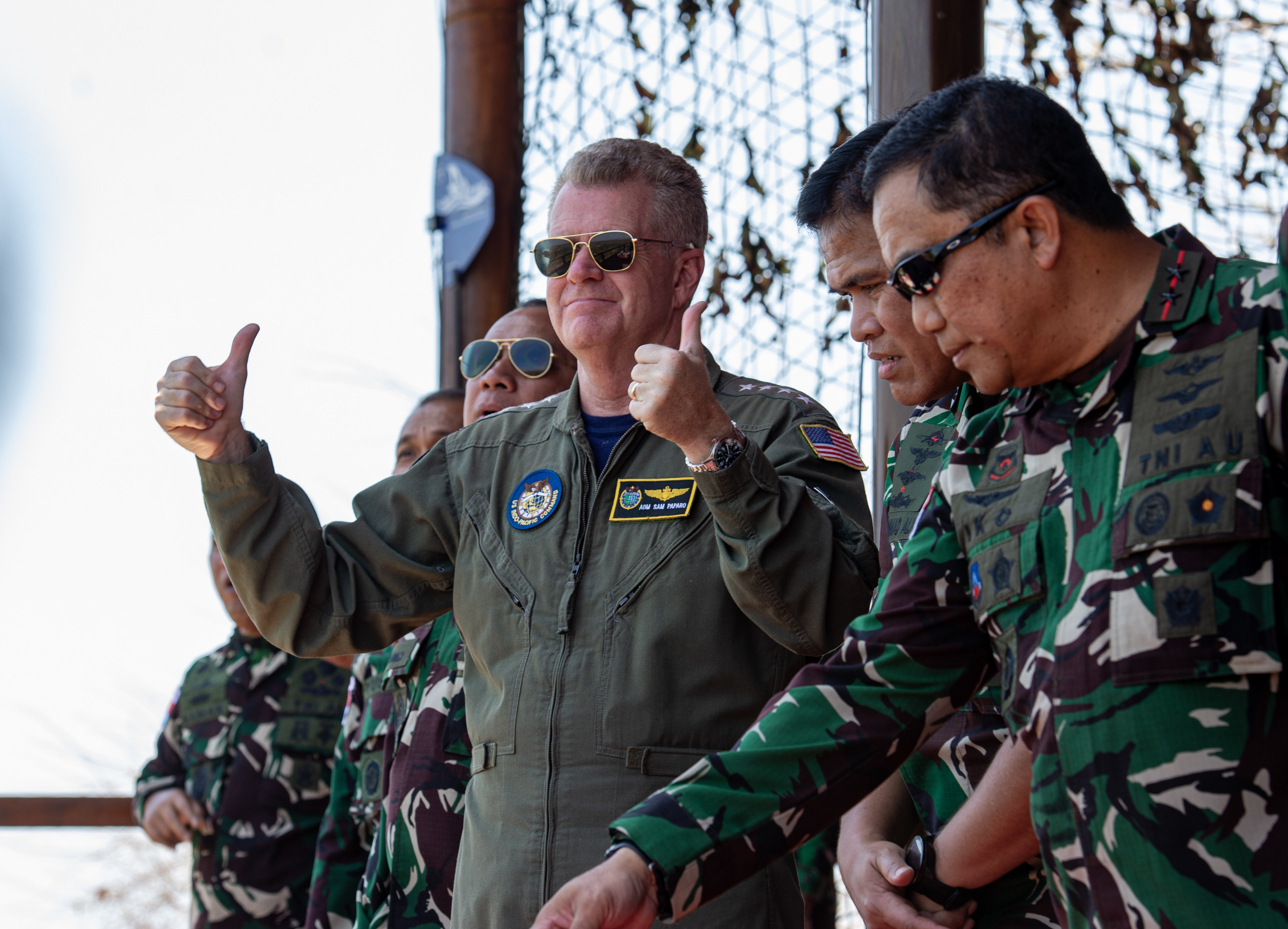 U.S. Navy Adm. Samuel Paparo, left, commander of U.S. Indo-Pacific Command, gives two thumbs up after a successful strike during the joint strike exercise to begin during Super Garuda Shield 2024, near Puslatpur 5, Indonesia, Aug. 31, 2024. Super Garuda Shield 2024 represents the third consecutive time the exercise is conducted as a multinational, combined and joint event, focused on a commitment to partnership and a free and open Indo-Pacific. (U.S. Navy photo by Mass Communication Specialist 1st Class Kurtis A. Hatcher)