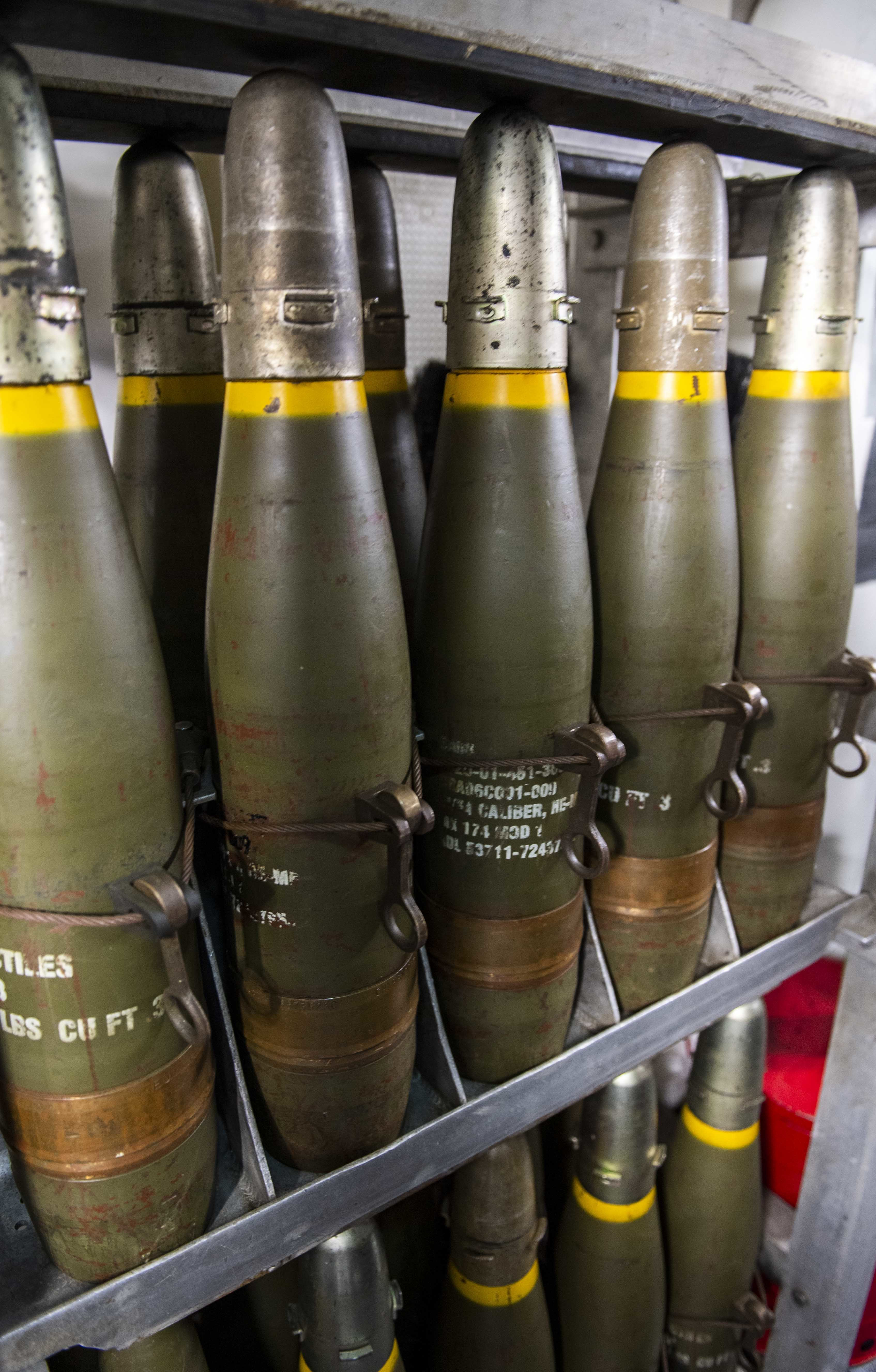 190525-N-CL550-0118 PHILIPPEAN SEA (May 25, 2019) — Seventy-pound shells for the 5-inch/54 caliber gun aboard the Arleigh Burke-class guided-missile destroyer USS Curtis Wilbur (DDG 54) are stored in the loader missile drum roll during a live-fire demonstration as part of Pacific Vanguard (PACVAN). PACVAN is the first of its kind quadrilateral exercise between Australia, Japan, Republic of Korea, and U.S. Naval forces. Focused on improving the capabilities of participating countries to respond together to crisis and contingencies in the region, PACVAN prepares the participating maritime forces to operate as an integrated, capable, and potent allied force ready to respond to a complex maritime environment in the Indo-Pacific region. (U.S. Navy photo by Mass Communication Specialist 2nd Class Taylor DiMartino/Released)