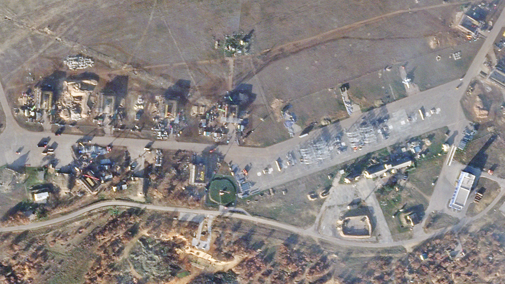 Recent satellite imagery of Belbek Air Base, near Sevastopol in Russian-occupied Crimea, shows new hardened aircraft shelters and additional construction to help shield aircraft from drone attacks and other indirect fire.