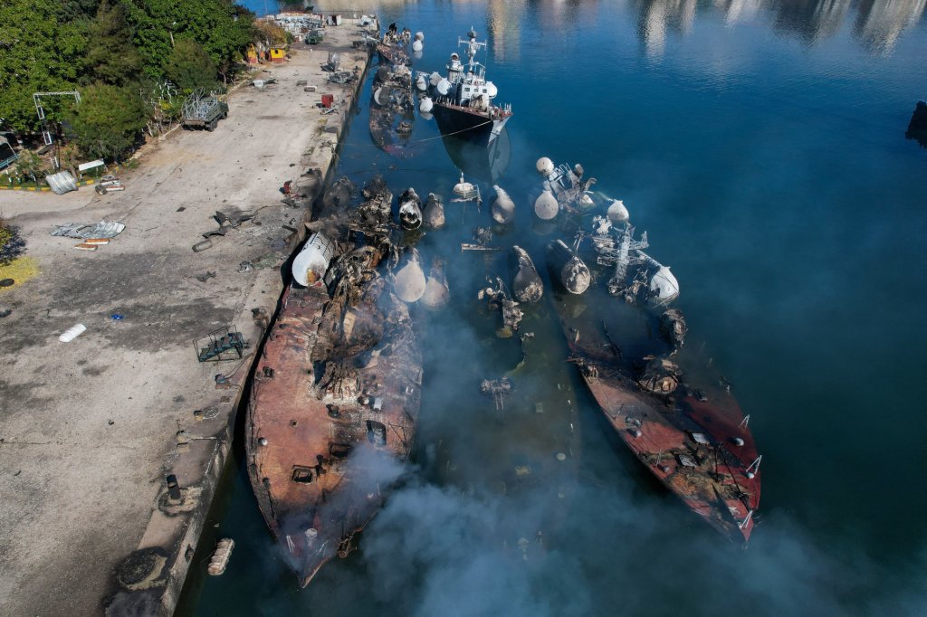 TOPSHOT - An aerial photo shows Syrian naval ships destroyed during an overnight Israeli attack on the port city of Latakia on December 10, 2024. The UN special envoy for Syria on December 10 called on Israel to halt its military movements and bombardments inside Syria, days after the fall of president Bashar al-Assad. (Photo by AAREF WATAD / AFP) (Photo by AAREF WATAD/AFP via Getty Images)