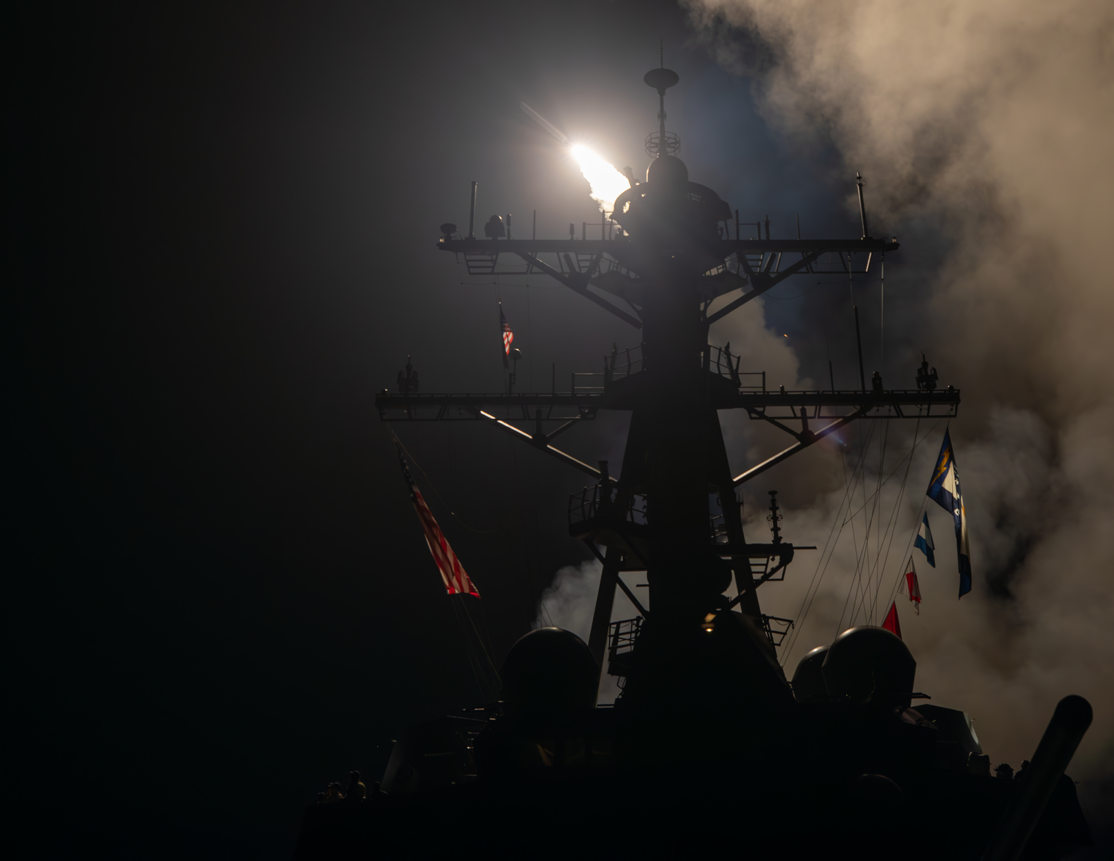 The guided-missile destroyer USS Gravely (DDG 107) launches Tomahawk Land Attack Missiles in response to increased Iranian-backed Houthi malign behavior in the Red Sea Jan. 12, 2024. As a part of the USS Dwight D. Eisenhower Carrier Strike Group, Gravely is deployed to the U.S. 5th Fleet area of operations to support maritime security and stability in the Middle East. (U.S. Navy photo by Mass Communication Specialist 1st Class Jonathan Word)