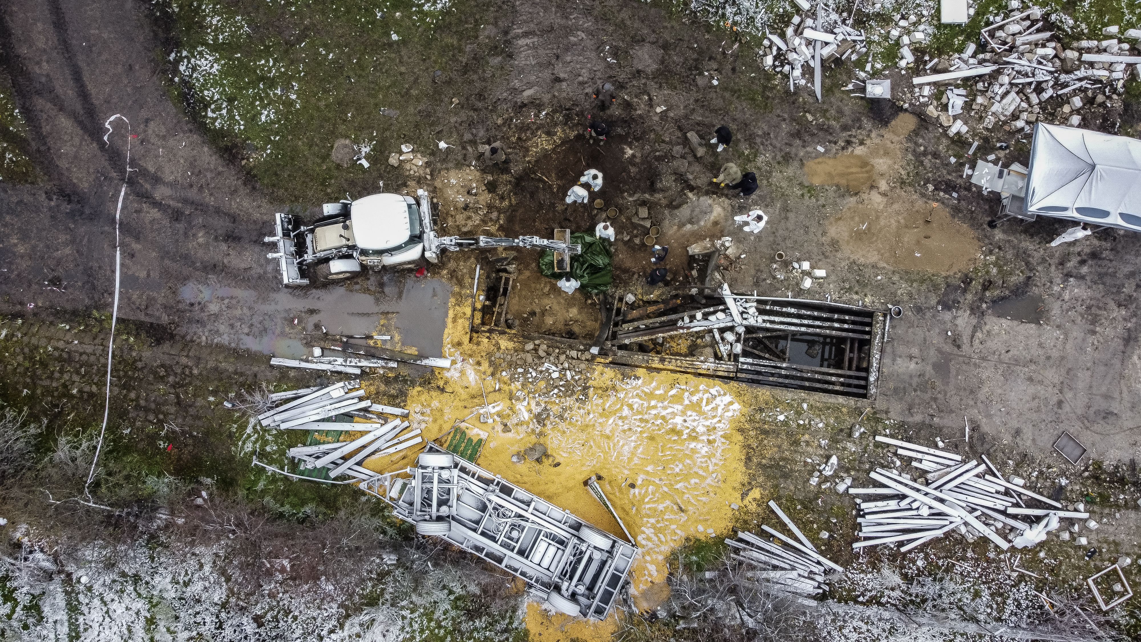 TOPSHOT - Aerial view taken on November 17, 2022 shows the site where a missile strike killed two men in the eastern Poland village of Przewodow, near the border with war-ravaged Ukraine on November 15, 2022. - The strike occurred in the afternoon of November 15, 2022, as Russia targeted Ukraine with a massive attack on civilian infrastructure, which has left millions of households without power. In the immediate aftermath of the incident there were fears it could mark a new escalation in the conflict, but by November 16, 2022 Poland announced the projectile likely originated from Ukraine's own air defences. That theory was then endorsed by Washington. (Photo by Wojtek RADWANSKI and Damien SIMONART / AFP) (Photo by WOJTEK RADWANSKI,DAMIEN SIMONART/AFP via Getty Images)