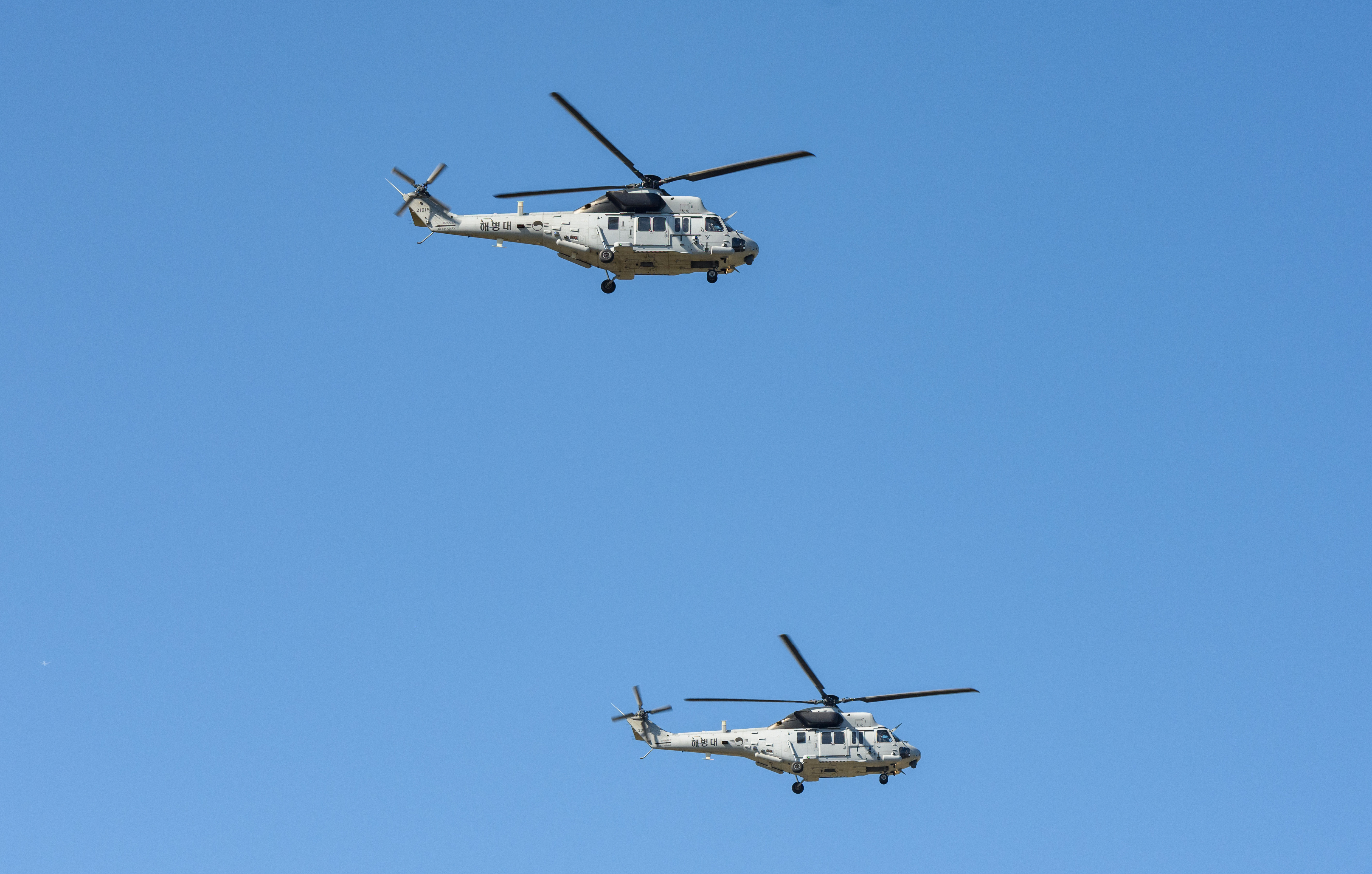 SEONGNAM, SOUTH KOREA - 2023/10/16: South Korea's Marine Utility Helicopter (MUH-1) stage an aerial demonstration during a Media Day event for the Seoul International Aerospace and Defense Exhibition (ADEX) 2023 held at the Seoul Air Base in Seongnam, south of Seoul. The organizers announced that the 2023 Seoul International Aerospace and Defense Exhibition (ADEX) will open at Seoul Air Base in Seongnam from October 17 to 22, and 550 companies from 35 countries will participate. (Photo by KIM Jae-Hwan/SOPA Images/LightRocket via Getty Images)