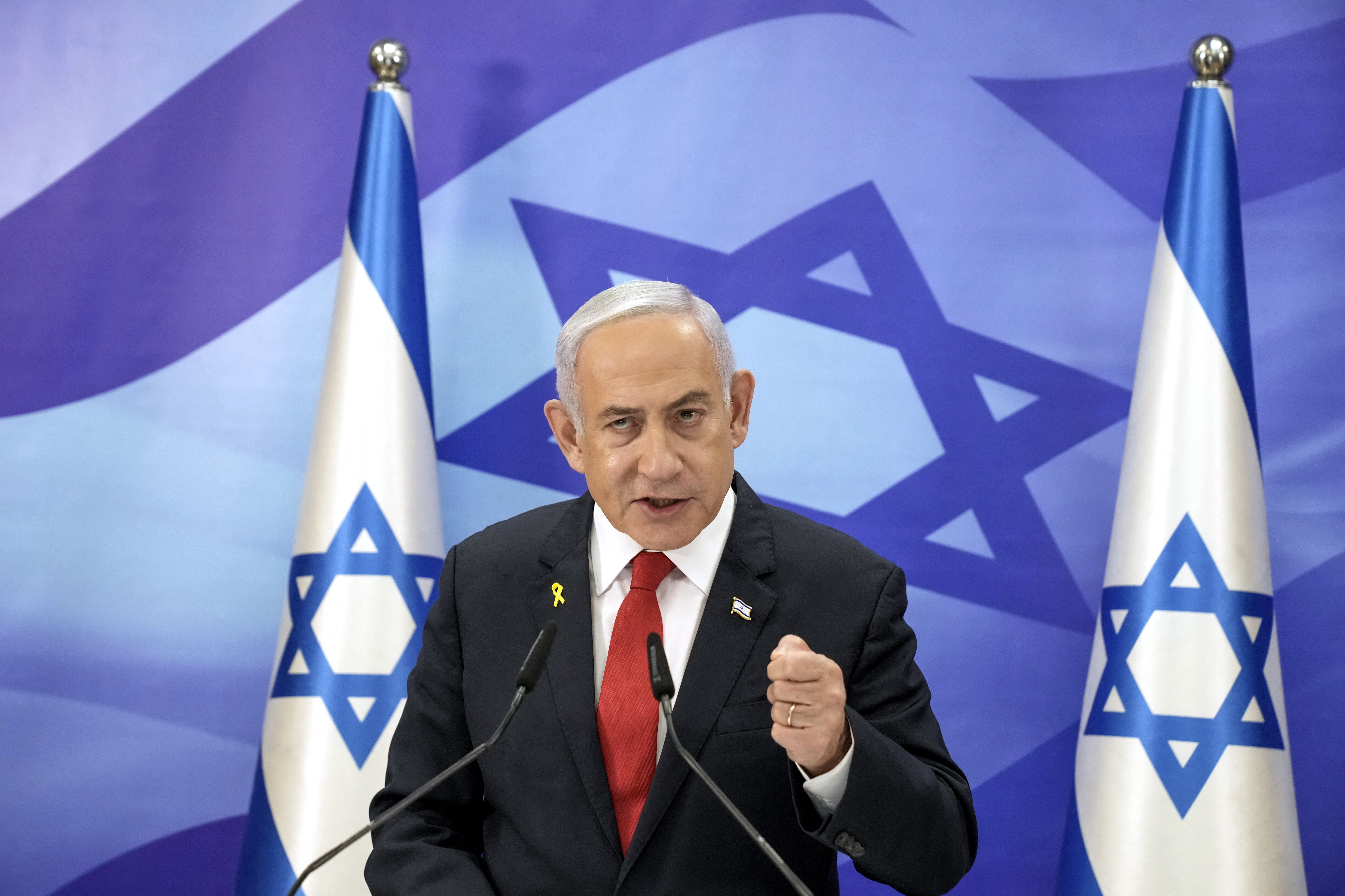 TOPSHOT - Israeli Prime Minister Benjamin Netanyahu speaks during a press conference in Jerusalem on December 9, 2024. Netanyahu said on December 9 that the occupied Golan Heights would remain Israeli "for eternity", days after he ordered troops into an adjacent UN buffer zone in Syria following the fall of Bashar al-Assad. (Photo by Maya Alleruzzo / POOL / AFP) (Photo by MAYA ALLERUZZO/POOL/AFP via Getty Images)