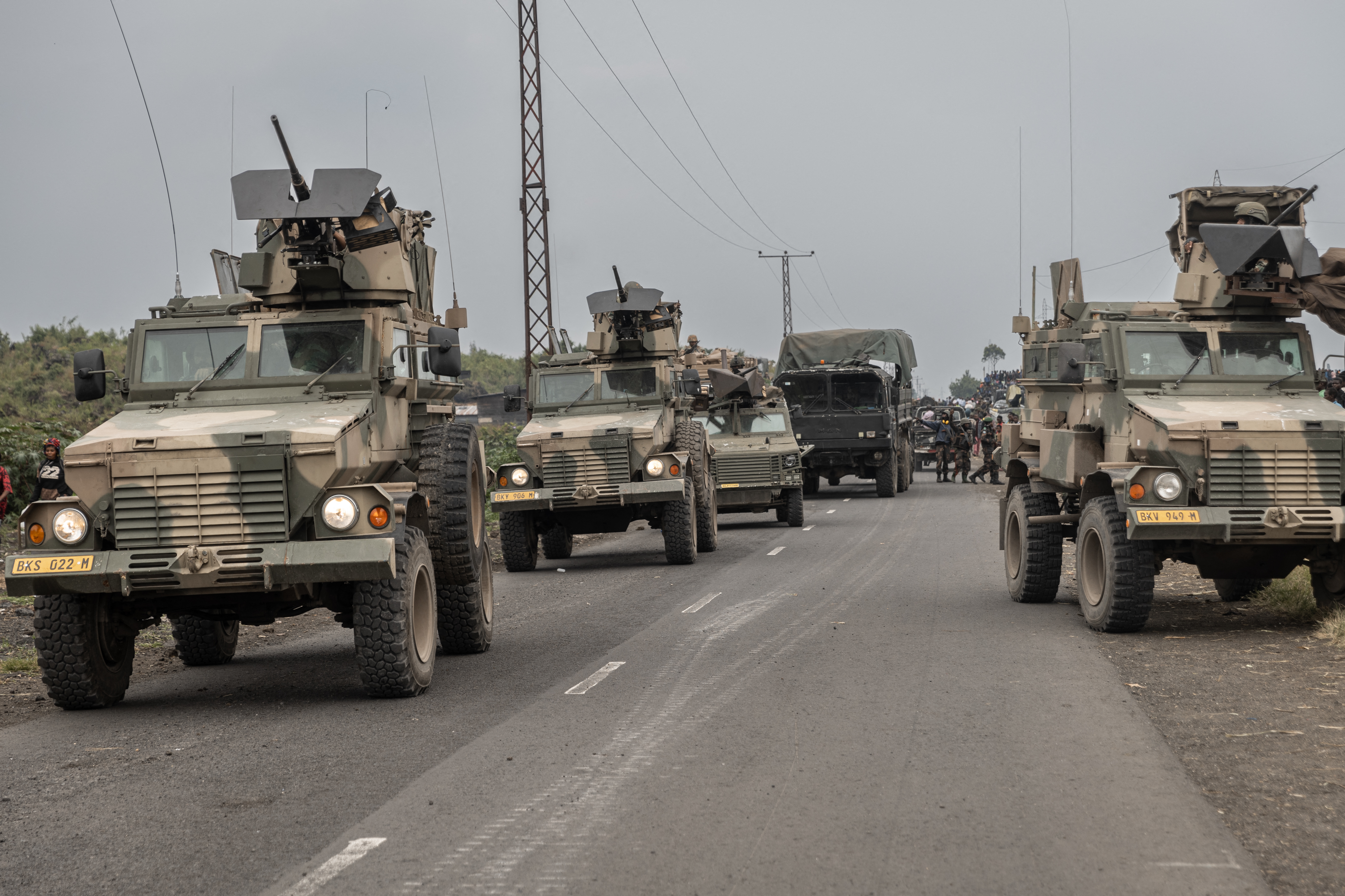 Armored vehicles belonging to the South Africa National Defence Forces (SANDF) contingent of the United Nations Organization Stabilization Mission in the Democratic Republic of the Congo (MONUSCO) drive towards deploy along the road leading to the entrance of the town of Sake, 25km north-west of Goma, on January 23, 2025. The M23 armed group has seized further territory in the east of the Democratic Republic of Congo and on Thursday was continuing to tighten its grip on provincial capital Goma, which is almost surrounded by fighting. (Photo by Michael Lunanga / AFP) (Photo by MICHAEL LUNANGA/AFP via Getty Images)