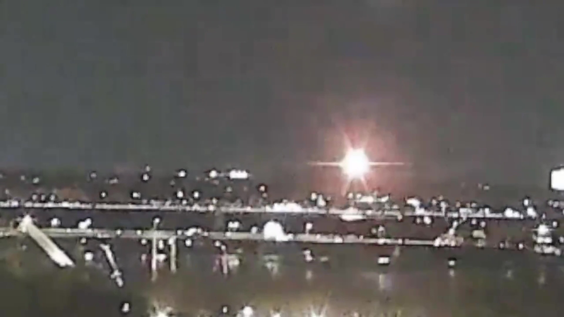 WASHINGTON DC, UNITED STATES - JANUARY 29: (----EDITORIAL USE ONLY - MANDATORY CREDIT - 'KENNEDY CENTER CAM' / HANDOUT' - NO MARKETING NO ADVERTISING CAMPAIGNS - DISTRIBUTED AS A SERVICE TO CLIENTS----) A screen grab captured from a video shows a regional plane collided in midair with a military helicopter and crashed into the Potomac River in Washington, D.C. United States on January 29, 2025. (Photo by Kennedy Center Cam/Anadolu via Getty Images)