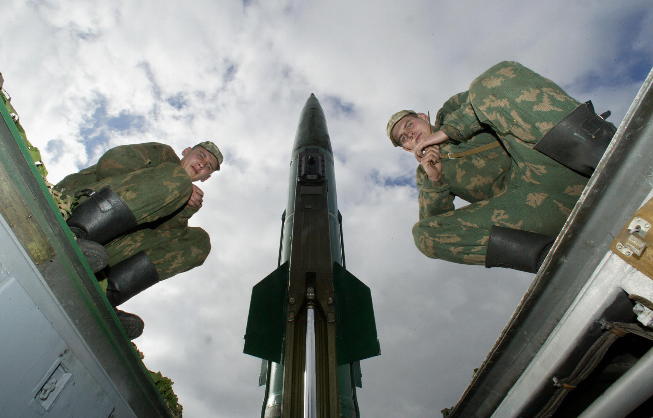 KALININGRAD, RUSSIA: Russian soldiers sit on the launch pad of the Pillar M (Point M), a short-range missile with a range of about 44 miles (70 kilometers), before launch at a military training range on the outskirts of the Russian enclave of Kaliningrad. , October 5, 2005. AFP PHOTO (Photo credit STRINGER/AFP via Getty Images)