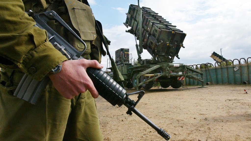 An Israeli soldier stands alongside a Patriot missile launcher as the anti-aircraft and anti-ballistic missile missile is made ready to launch February 27, 2003 from Hafetz Hayim army base near the town of Gadera, Israel. The Israeli army demonstrated the readiness of its improved Patriot system to the press ahead of an expected coalition attack against Iraq. In the 1991 Gulf War, the Baghdad regime launched 39 Scud missiles against the Jewish state.