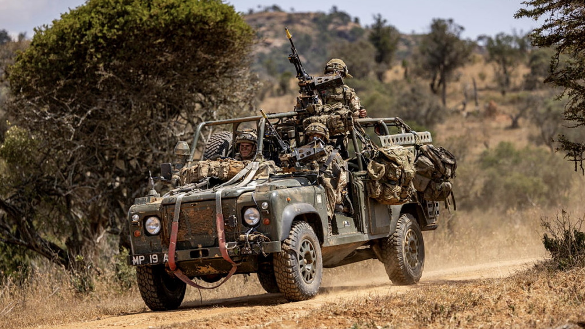 Soldiers driving Revised Weapons Mount Installation Kit (RWMIK) from Support Company, 3rd Battalion, The Parachute Regiment, on their way to defensive positions during Exercise Haraka Storm, Kenya, on the 19th of July 2023. The British Army’s global response force has tested its ability to deploy and fight at short notice in some of Africa’s most challenging environments. The soldiers of 3 PARA Battlegroup honed both their fighting and fieldcraft skills on the Kenyan savannah as part of the six-week long Exercise Haraka Storm. Dealing with the rough terrain, searing heat and potentially deadly animals - ranging from lions and elephants to scorpions and snakes – troops followed a progression of training, building from polishing their individual skills and specialities to a final mission which sees the whole force operating together to assault a heavily-defended objective. The 1,000-strong battlegroup is built around the airborne infantry of Colchester-based 3rd Battalion The Parachute Regiment, bolstered by artillery, engineers, signallers, medics, and logisticians from across 16 Air Assault Brigade Combat Team. Specially trained and equipped to deploy by parachute, helicopter or airlanding, the 3 PARA Battlegroup is currently held at very high readiness to respond to global crises. In April, it deployed to Sudan to provide security and logistic support to the evacuation of British civilians.