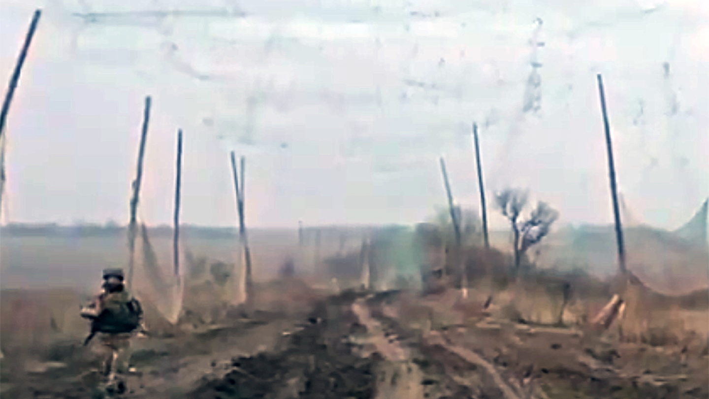 Russian troops built a mesh net 'tunnel' to protect against Ukrainian FPV drones.