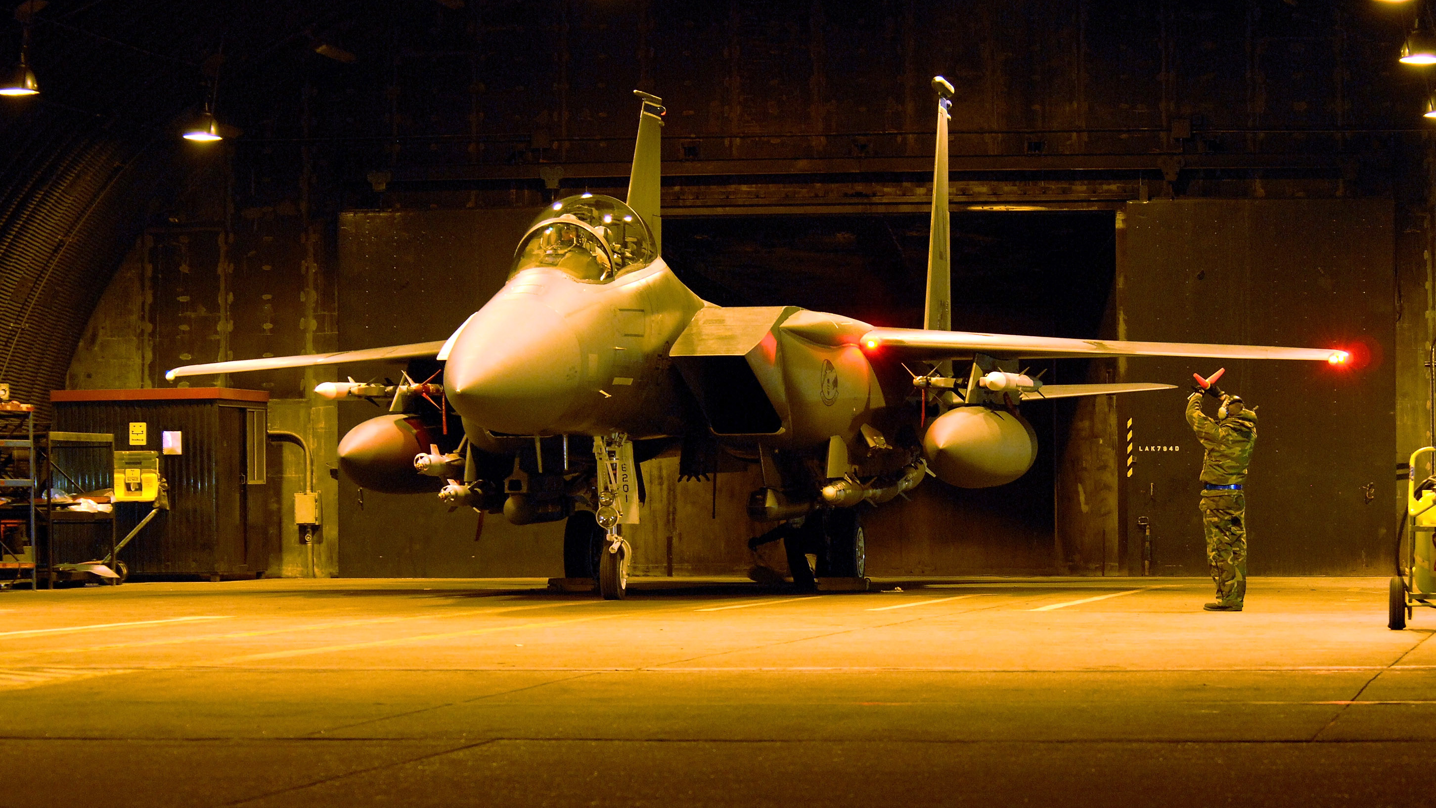 In this handout image provided by the U.S. Air Force, 492nd FS commander, prepare to taxi their F-15E Strike Eagle prior to their departure from RAF Lakenheath in preparation for Operation Odyssey Dawn missions March 19, 2011 in Lakenheath, United, Kingdom. Approximately 112 cruise missiles fired from U.S. and British ships and submarines targeting about 20 radar and anti-aircraft sites along Libya's Mediterranean coast.