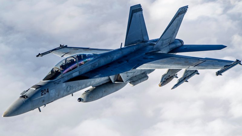 A U.S. Navy F/A-18F Super Hornet from the "Mighty Strikes" of Strike Fighter Squadron (VFA) 94, flies over the U.S. Central Command area of responsibility while conducing a mission in support of Operation Inherent Resolve Oct. 2, 2020. VFA-94 is assigned to Carrier Air Wing 17, deployed aboard the aircraft carrier USS Nimitz (CVN 68), the flagship of Nimitz Carrier Strike Group.