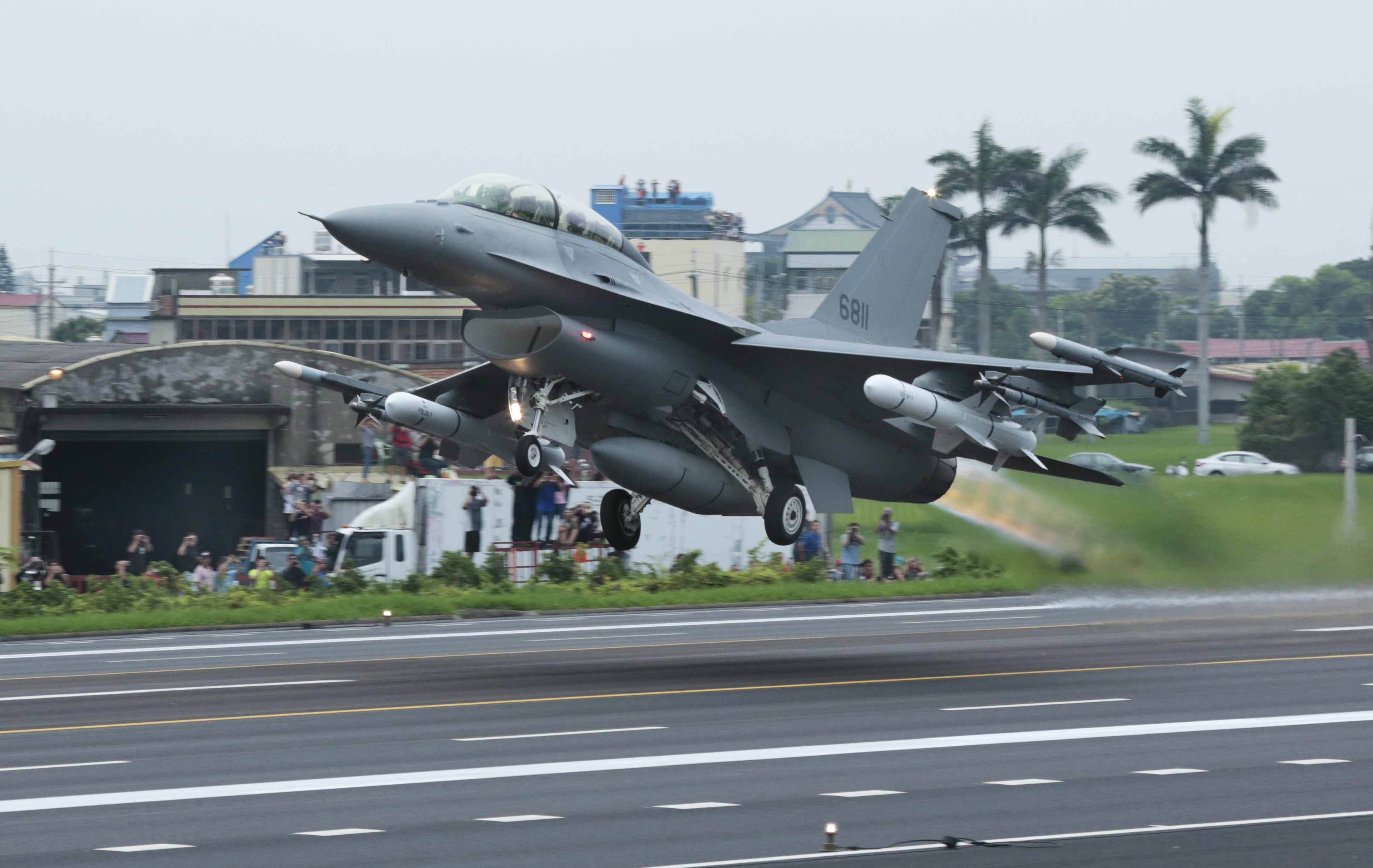  American F-16-V of Taiwan Air Force during a anti-invasion drill on hight-way road in Chang-Hua on May 28, 2019 in Chang-Hua, Taiwan. The live firing was part of annual exercices designed to prove the military's capabilities to repel any Chinese attack. China and Taiwan split during a civil war in 1949, but China claims Taiwan island as its territory. (Photo by Patrick Aventurier/Getty Images)