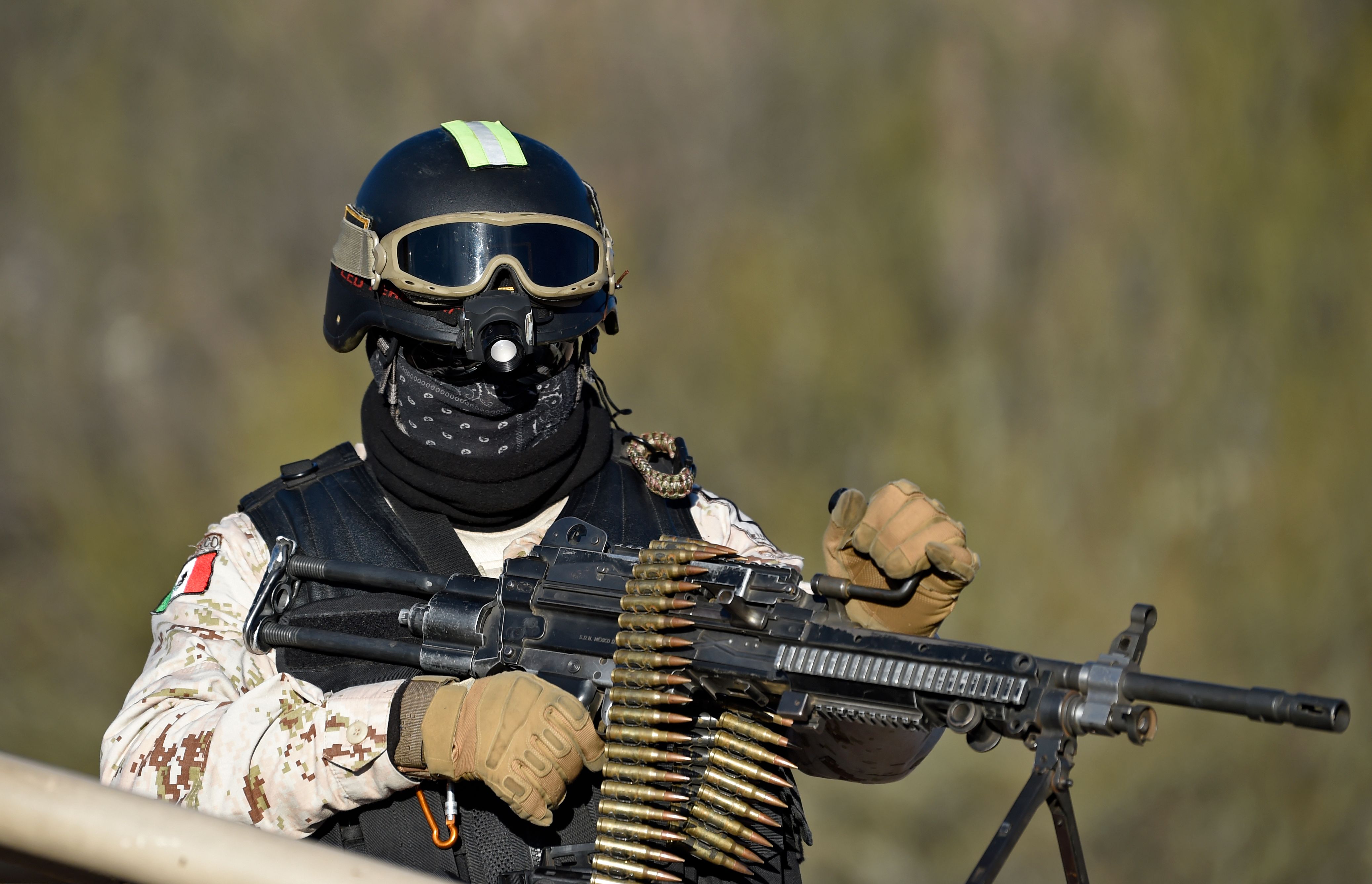 A member of the National Guard keeps watch at La Mora ranch, in Bavispe, Sonora State, Mexico, on January 12, 2020 where Mexican President Andres Manuel Lopez Obrador will meet with relatives of the Mormon massacre victims. - The November 4 ambush in which nine US women and children where killed, happened on an isolated dirt road in a region known for turf wars between drug cartels fighting over lucrative trafficking routes to the United States. (Photo by Alfredo ESTRELLA / AFP) (Photo by ALFREDO ESTRELLA/AFP via Getty Images)