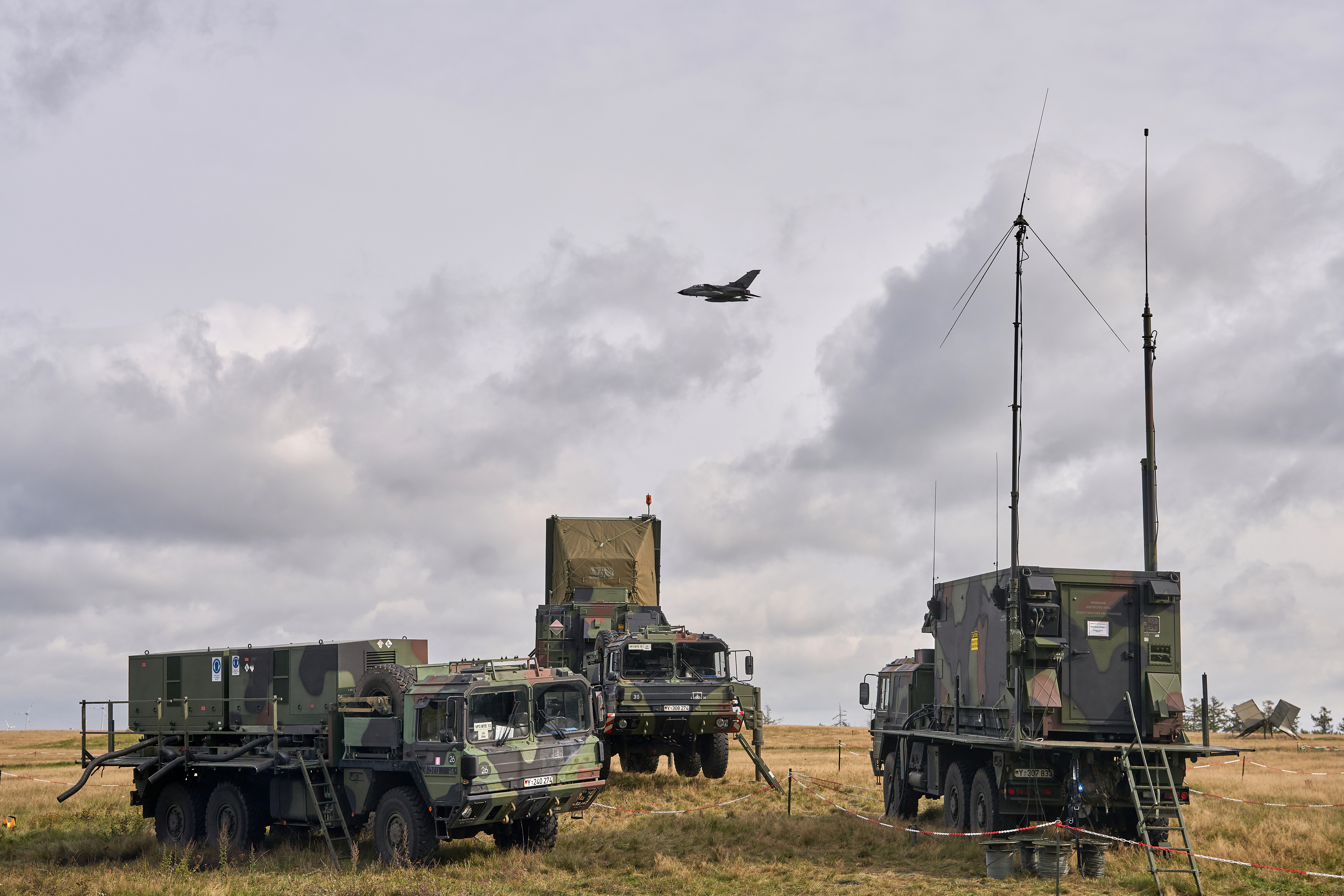 14 October 2020, Rhineland-Palatinate, Büchel: During the national air defence exercise "Resilient Guard 2020" at Büchel air base, an air force Tornado flies over the control centre of the "Patriot" air defence system. 600 soldiers take part in the exercise. Photo: Thomas Frey/dpa (Photo by Thomas Frey/picture alliance via Getty Images)