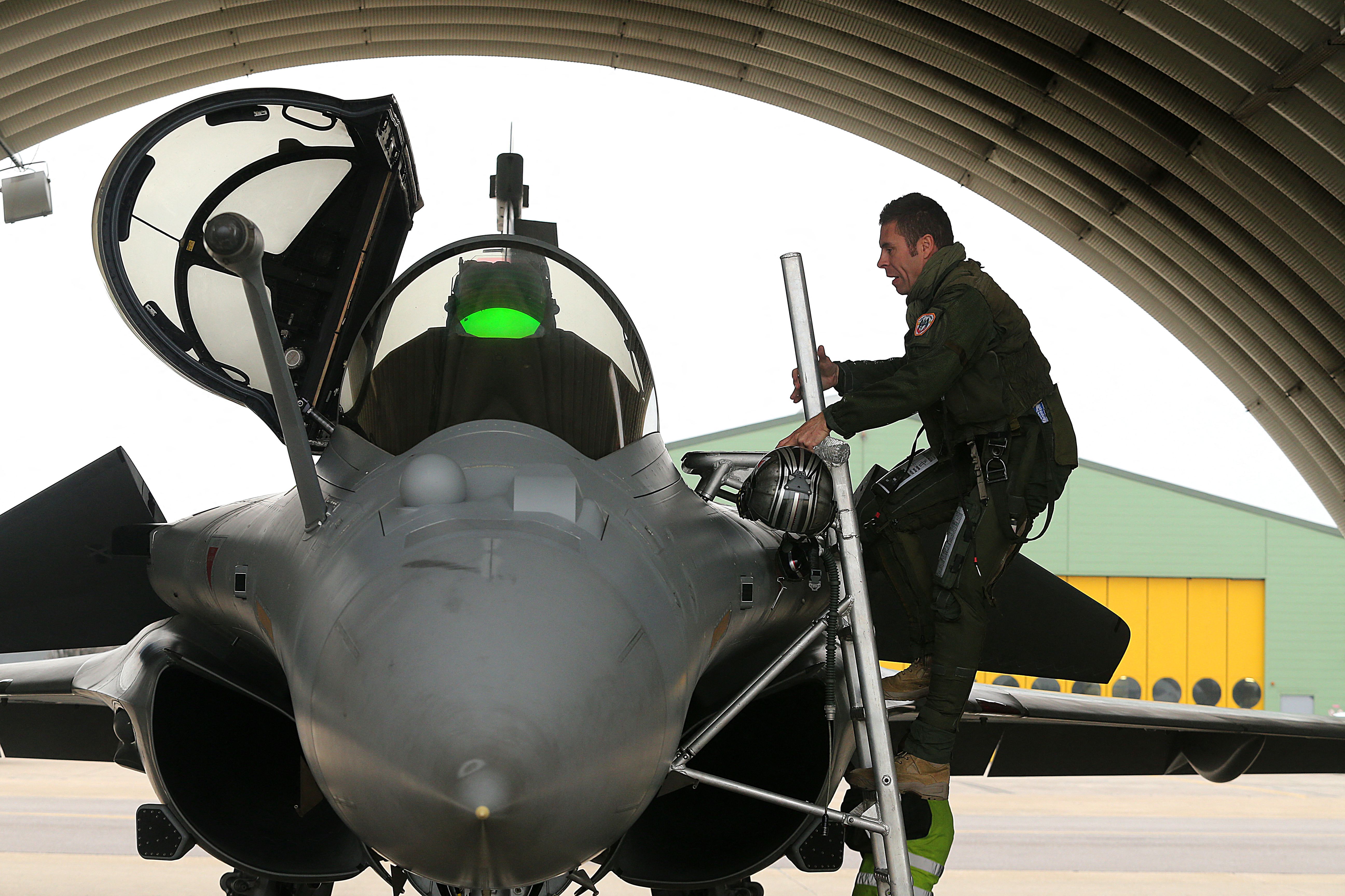 Pilot Jerome Thoule "Schuss" boards a Rafale Solo Display (RSD) aircraft during its official presentation at Saint-Dizier air base 113 on March 9, 2021. - Dassault Aviations Rafale, which is a multirole combat aircraft, began its training flights on February 1, 2021. (Photo by FRANCOIS NASCIMBENI / AFP) (Photo by FRANCOIS NASCIMBENI/AFP via Getty Images)