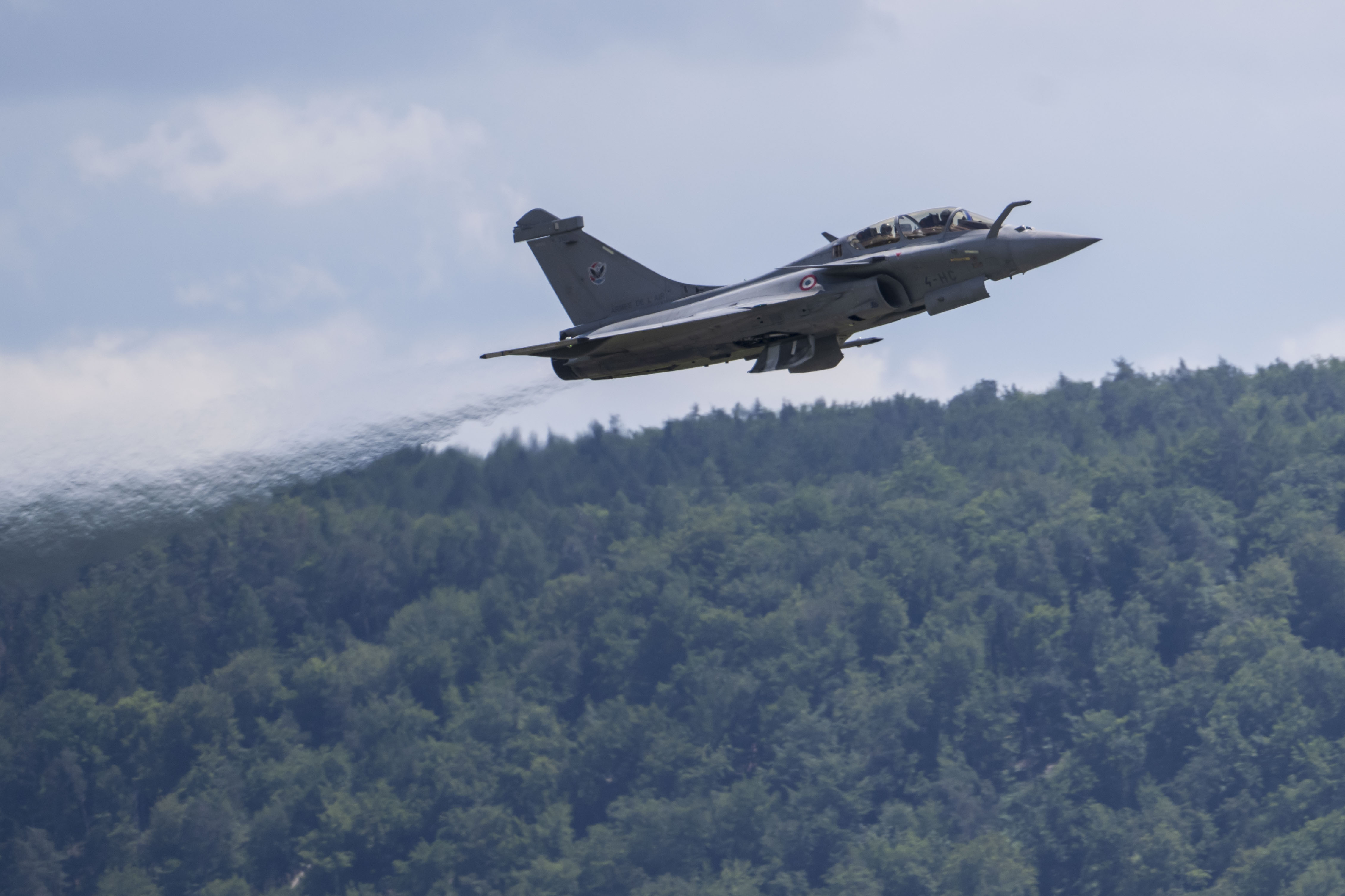 RAMSTEIN-MIESENBACH, GERMANY - JUNE 06: A Dassault Rafale C (top) combat airplane flies over Ramstein Air Base during a day of fighter plane exercises on June 06, 2024 in Ramstein-Miesenbach, Germany. Combat aircraft from NATO countries are duelling today in one versus one exercises hosted at Ramstein. (Photo by Thomas Lohnes/Getty Images)