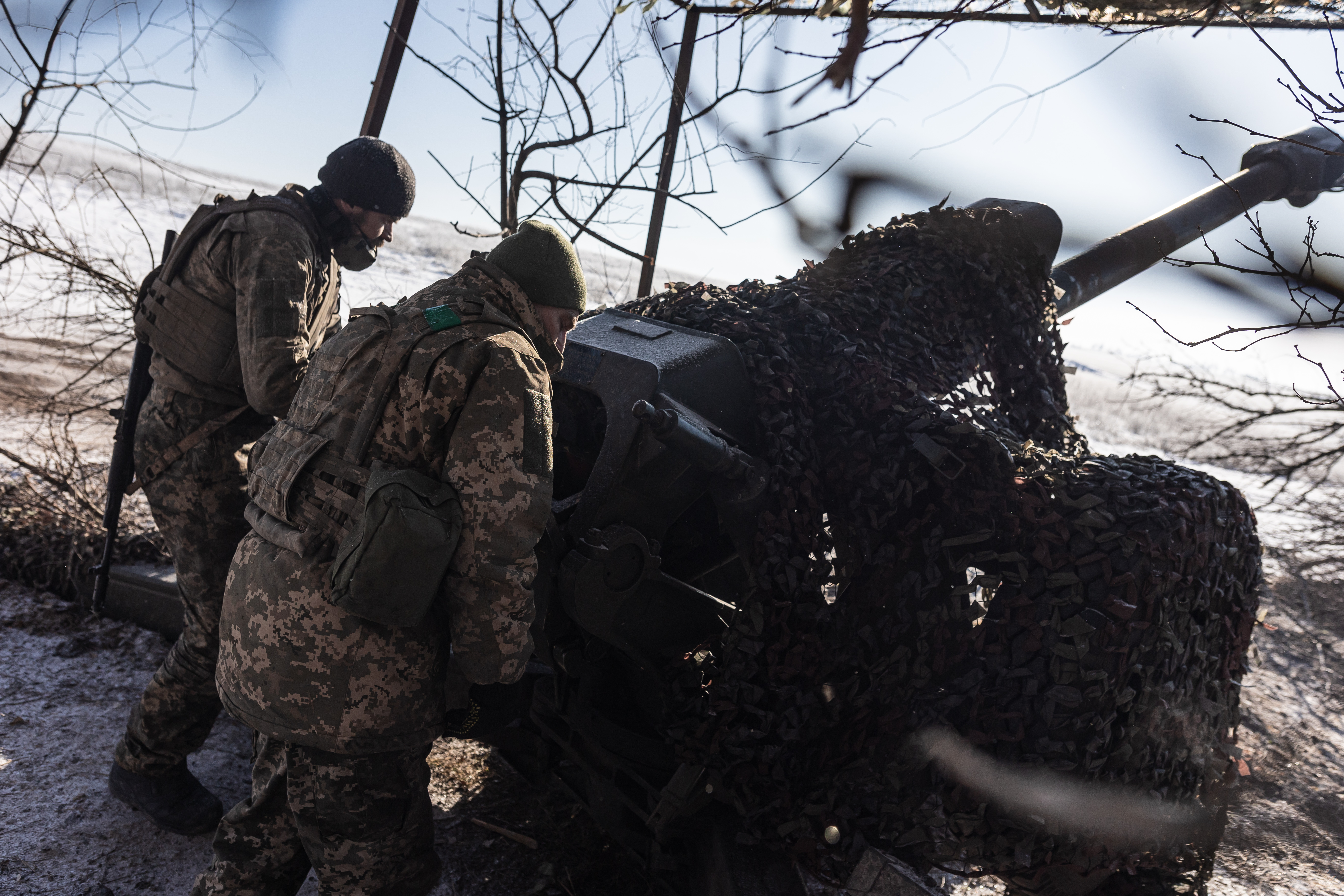 DONETSK OBLAST, UKRAINE - FEBRUARY 17: Ukrainian soldiers of the 117th Brigade fire D-30 artillery in the direction of Pokrovsk, Ukraine on 17 February 2025. (Photo by Diego Herrera Carcedo/Anadolu via Getty Images)