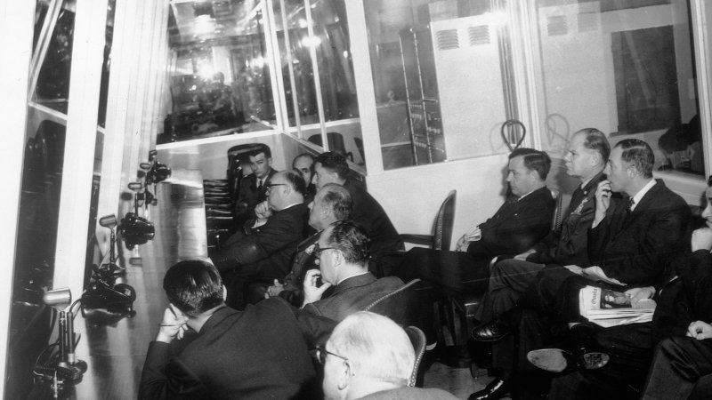 General Secretary of NATO Paul Henri Spaak of Belgium and United States Air Force General T.S. Power visit the Headquarters Strategic Air Comand control room with a contingency of officers. | Location: Offut Air Force Base, Nebraska, USA. (Photo by © CORBIS/Corbis via Getty Images)