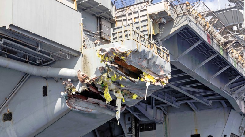 The U.S. Navy has released an image showing damage to the aircraft carrier USS Harry S. Truman following the collision with the cargo ship M/V Besiktas-M off the coast of Egypt in the Mediterranean Sea on Tuesday.