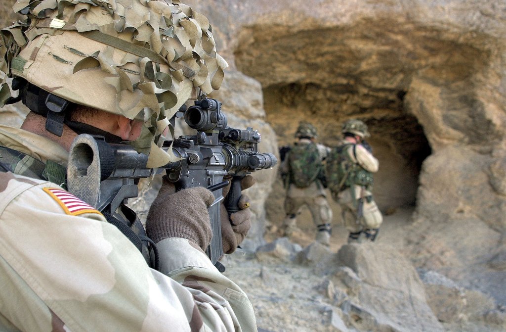  (FILE PHOTO) In this Department of Defense (DoD) handout photo, soldiers from the U.S. Army 82nd Airborne Division search a cave January 30, 2003 in the Adi Ghar mountains, Afghanistan. According to the U.S. Department of Defense, the soldiers were searching the caves looking for suspected Taliban hideouts or weapons caches (Photo by Leopold Medina Jr/U.S. ArmyGetty Images)