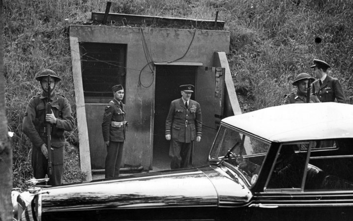 10th July 1943: British Air Force officer Sir Arthur 'Bomber' Harris, commander-in-chief of Bomber Command RAF, emerging from the bunker at Bomber Command after conferring with other RAF chiefs. Original Publication: Picture Post - 1473 - The Man Who Picks The Target For Tonight - pub. 1943 (Photo by Leonard McCombe/Picture Post/Getty Images)