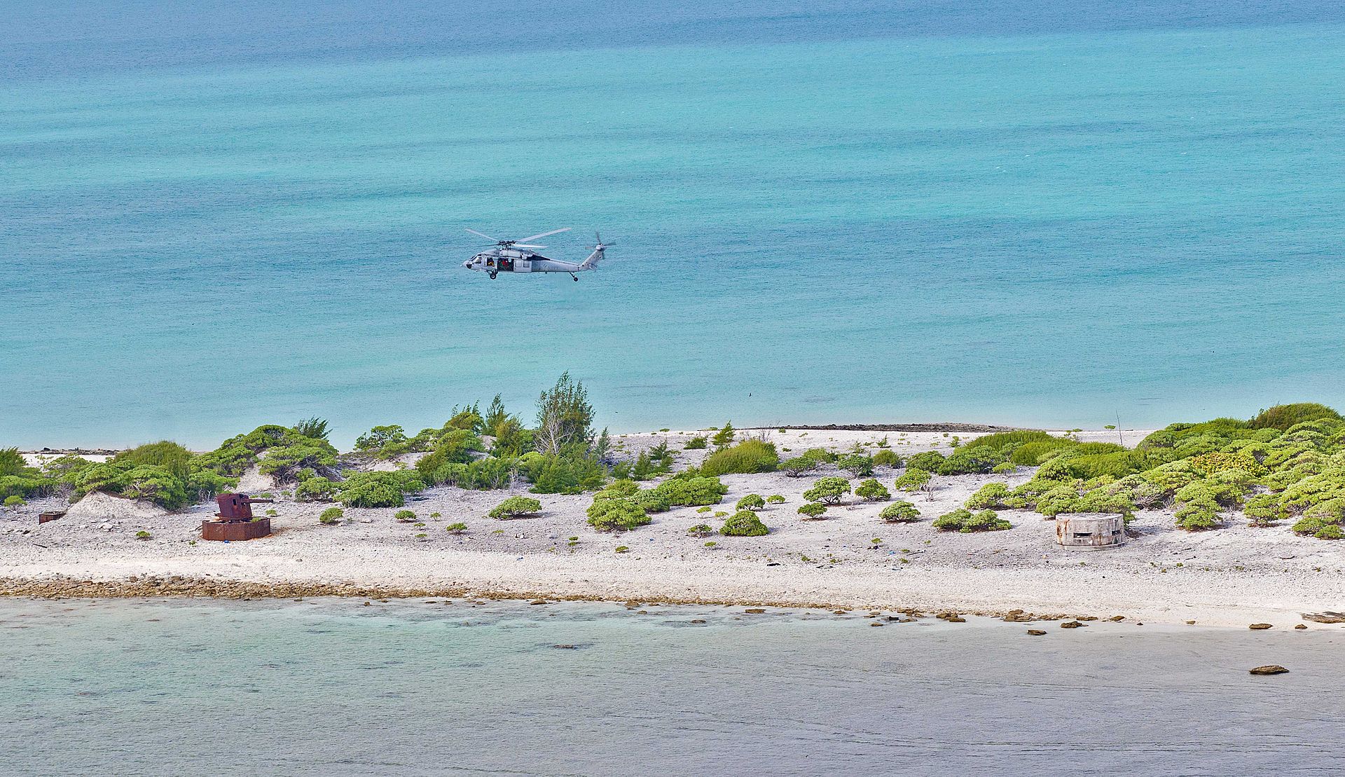 message-editor%2F1593729628132-1920px-flickr_-_official_u.s._navy_imagery_-_a_helicopter_flies_over_wake_island_during_practice_flight_operations..jpg