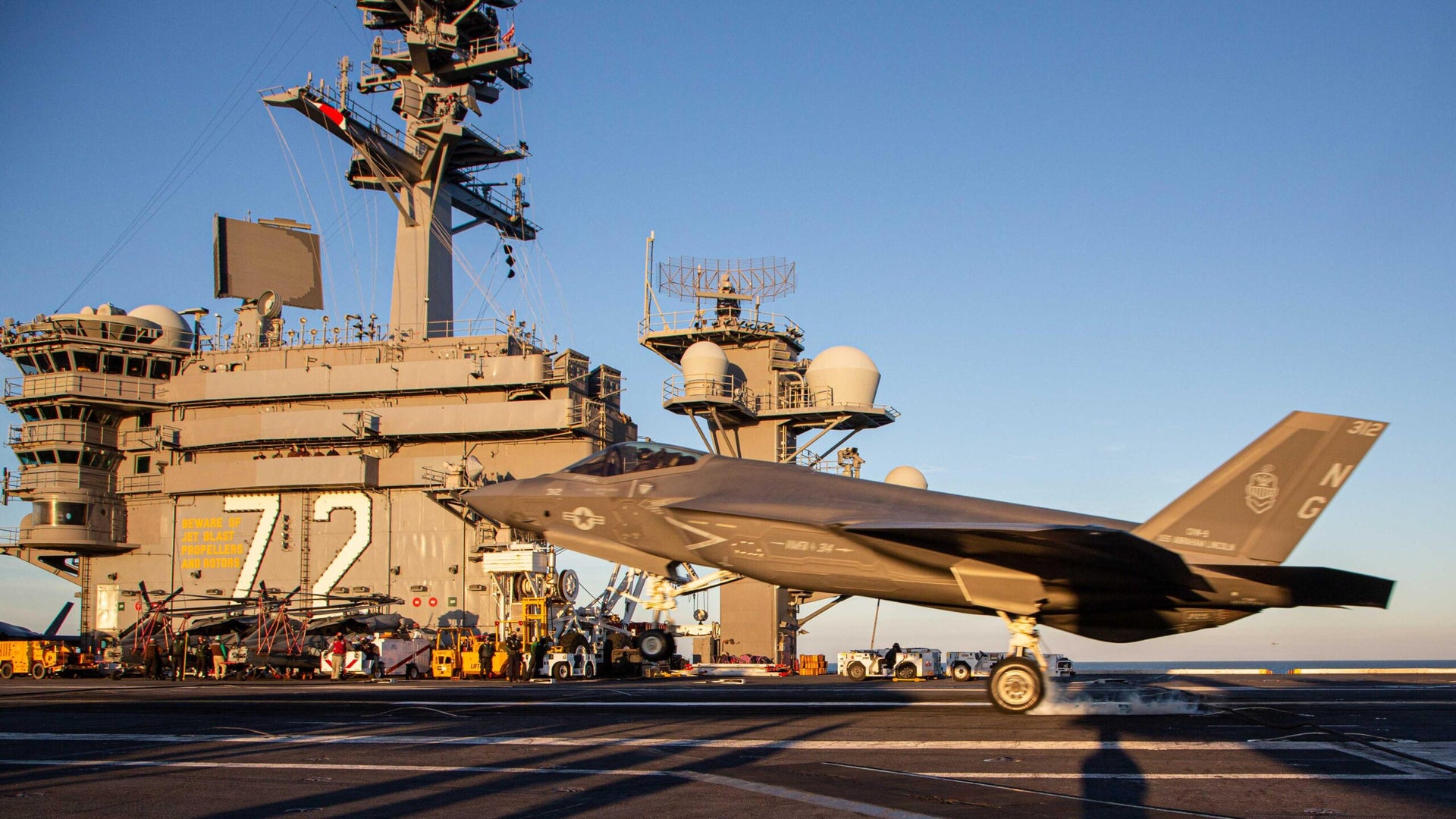 message-editor%2F1645047157357-marine_corps_f-35c_cvn-72-scaled.jpeg