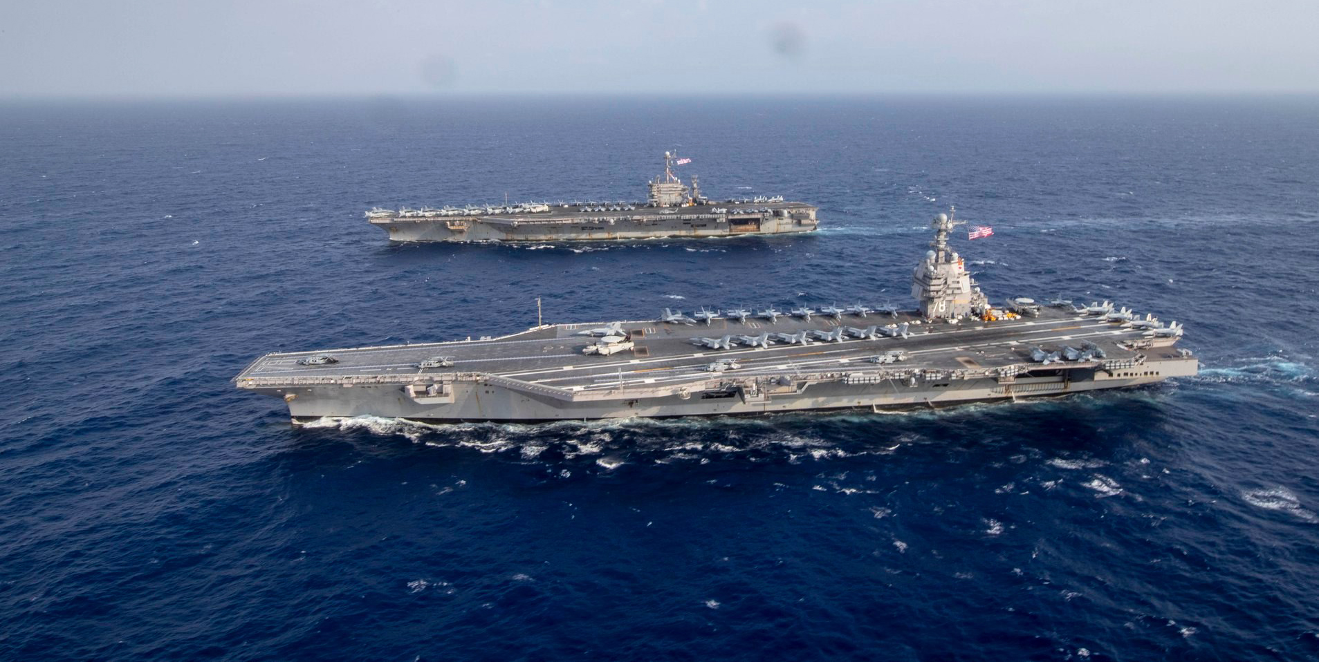 These Photos Of Ford And Nimitz Class Carriers Sailing Side-by-side 