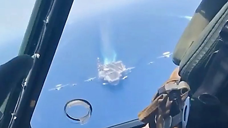 Here’s What A Photo Flyby Of A Carrier Group Looks Like From The Helicopter Taking The Pics